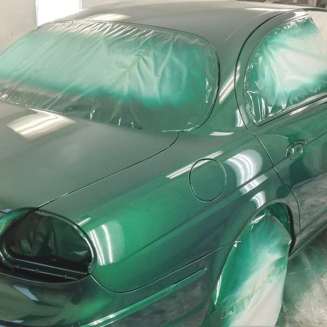 Classic car freshly sprayed green