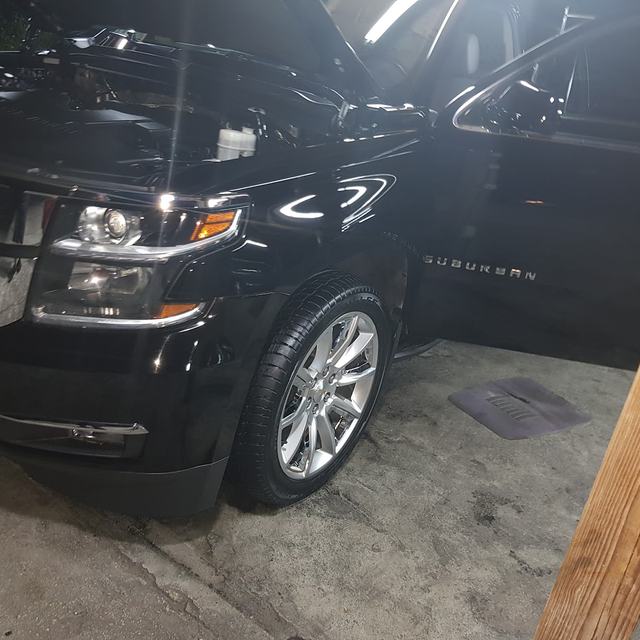 Black SUV in the shop